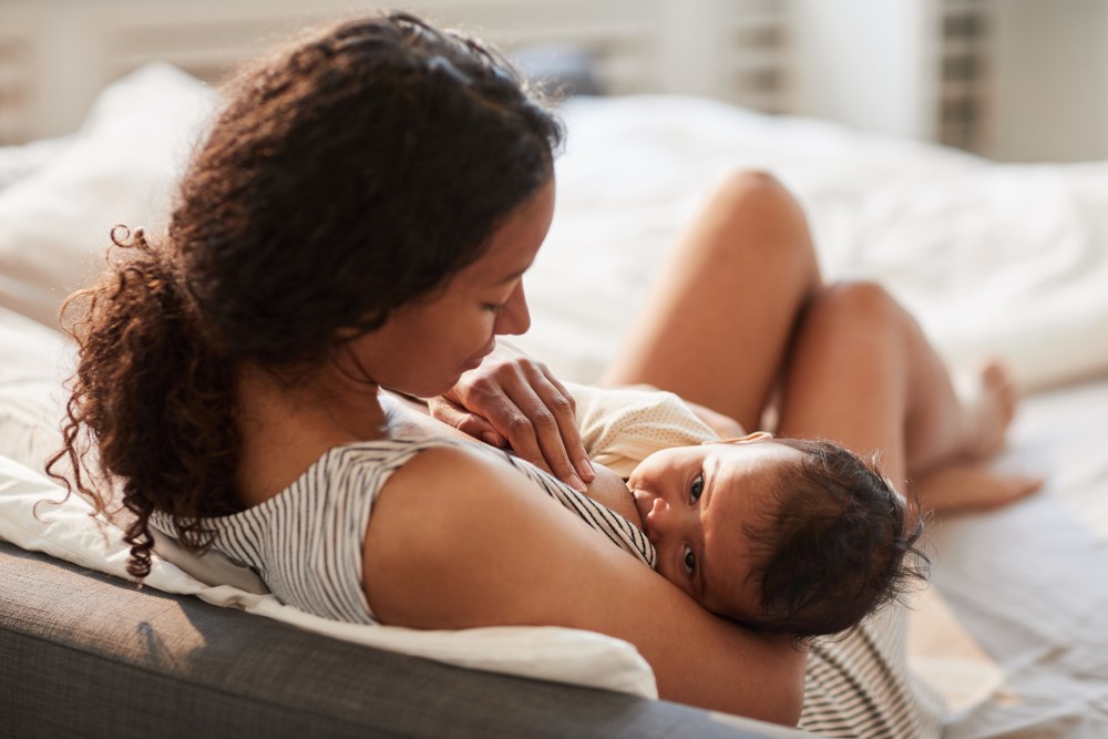 A mother breastfeeding her baby.