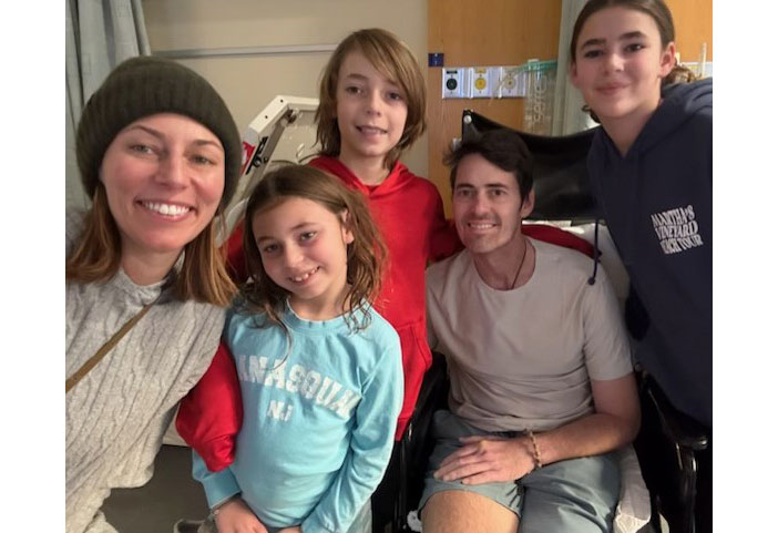 Sam with his wife and three children.