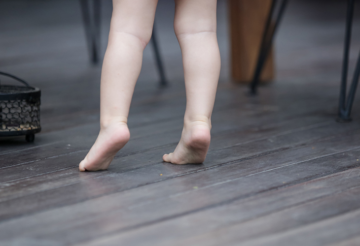 Baby walking on toes